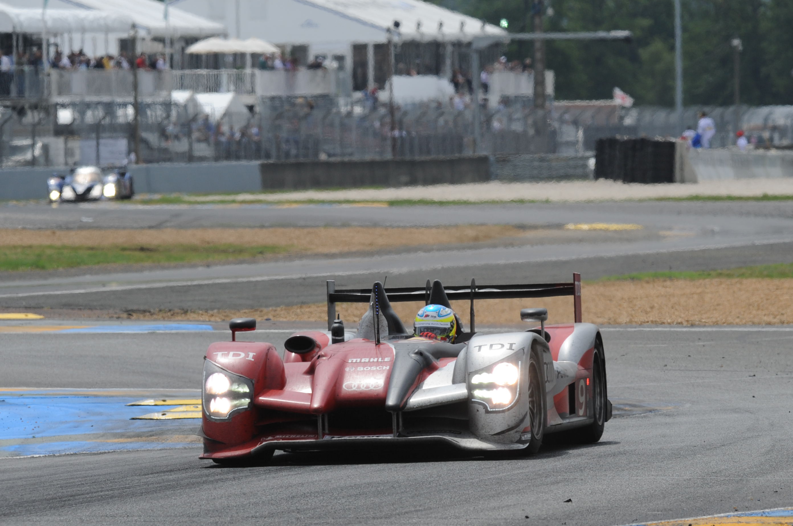 The last win (a hat trick) for an open cockpit car at Le Mans. The V10 TDI proved formidable and extremely reliable.